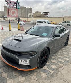 دۆج چارجەر